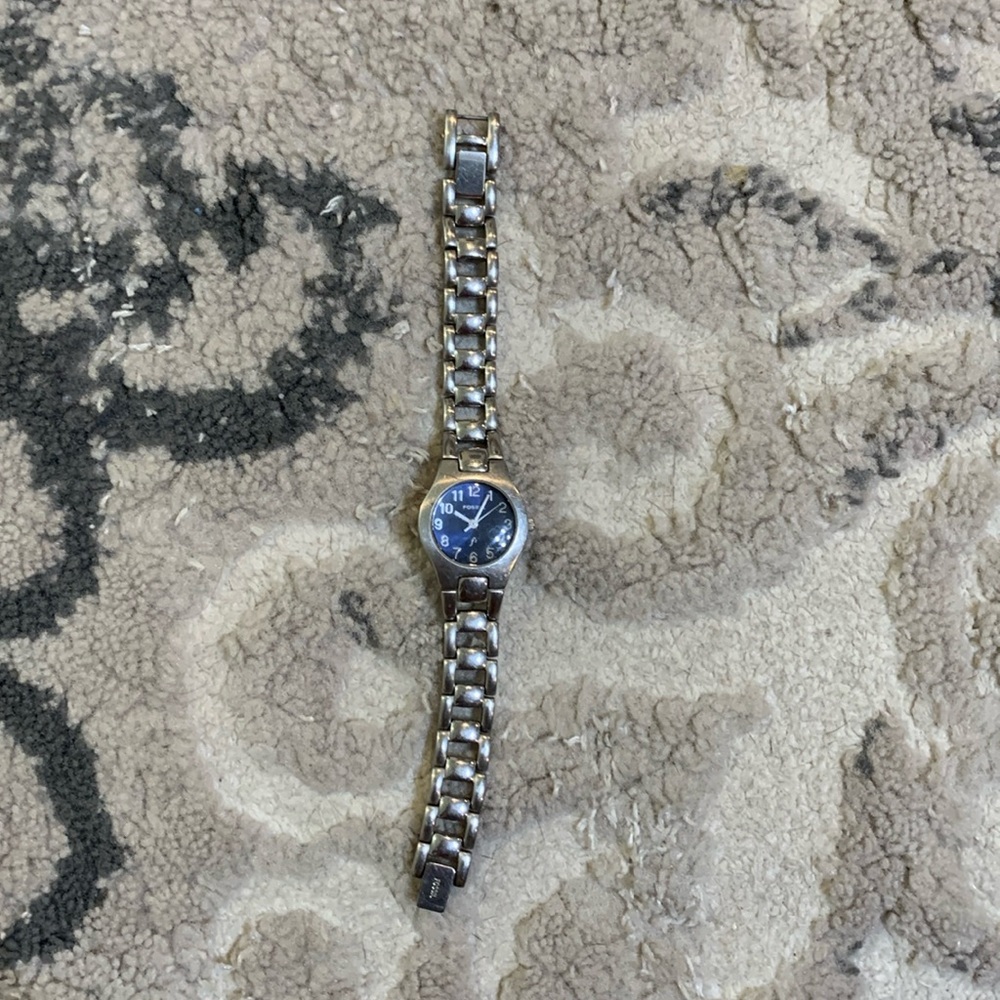 Woman’s Fossil Watch, silver with blue digital clock